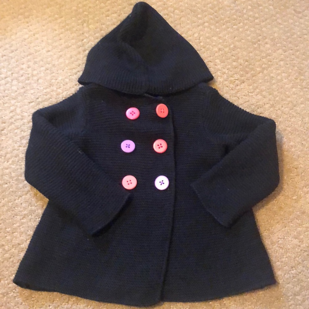 A sweater coat hooded